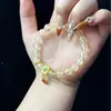 Jade dorado natural doble círculo ágata roja cuenta superior doble círculo pulsera de alta calidad diseño DIY original jade al por mayor mujeres
