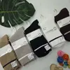 Calcetines de cachemir de doble puntada para hombre y mujer de invierno, calcetines de tubo de moda para mujer con rayas marrones y encaje, calcetines de algodón de cachemir hipoalergénicos para hombre de negocios