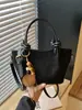 Bolso de hombro casual de nicho simple y elegante transfronterizo, nuevo bolso de mano popular estilo coreano otoño 2026, bolso de moda