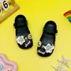 2026 Nuevos Zuecos de Princesa Ballet Verano Letra Camelia para Niños EVA para Exteriores Chanclas de Playa Cerradas