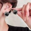 Pendientes de plata con luz de aguja, de lujo, de circonita negra de alta gama, con un toque de amor, pendientes geométricos de temperamento nicho, con un diseño único y sentido del humor.