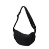 Bolso de un solo hombro para mujer ligero versátil deportivo casual bolsa tipo dumpling estilo artístico gran capacidad color sólido bolso de mano simple