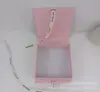 Caja de joyería abatible con cinta caja de libro para anillos collares pulseras embalaje de esponja caja de cartón venta al por mayor