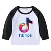 2026 Nueva Camiseta Infantil Transfronteriza de Primavera y Otoño Cuello Redondo Dibujos Animados Manga Larga Camiseta Básica para Niños y Niñas Camiseta de Algodón para Bebé