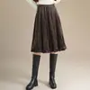 Saia Midi Plissada Evasê de Veludo Dourado Feminina Nova Outono/Inverno 2026 Cintura Alta Emagrecedora Saia Plissada Elegante para o Trabalho