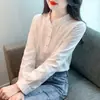 Camisa de algodón y lino jacquard con cuello de oreja de madera para mujer Primavera 2026 nuevo top versátil de manga larga ajustado para usar como base