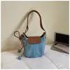 Transfronterizo 2026 Nuevo Modelo de Gama Alta Casual Simple Retro Versátil Bolso Cubo Bolso de Axila Bolso de Hombro Cruzado Bolso Calabaza