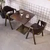 Juego de mesa y sillas retro en estilo industrial para bares, restaurantes occidentales, mesas de comedor para cafeterías, tiendas de té de leche, snack bars y restaurantes de barbacoa