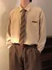 Camisa de manga larga estilo retro universitario americano para hombres y mujeres, primavera y otoño, diseño único, versátil, color liso, chaqueta camisa holgada