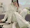 Nuevo pijama de mujer para primavera y otoño, de manga larga y pantalón largo, dulce y lindo conjunto de dos piezas tipo cárdigan de seda sintética, ropa para el hogar