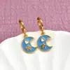 Tendencia de moda transfronteriza pendientes de estrella luna Joker pendientes incrustados en aceite circón personalidad joyería DIY al por mayor