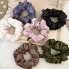 Gomas para el cabello brillantes y lustrosas estilo coreano para mujer, con un diseño plisado, material elástico que no daña el cabello y un aspecto de alta gama para coletas.