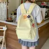 Mochila bordada floral de comercio exterior, mochila casual para estudiante, bolsa escolar simple de gran capacidad, versátil para ir al trabajo y viajar, para mujer