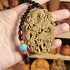 Fruta Marfil Marca Dragón Pieza de Mano Dragón Viaja por el Mundo Dragón del Zodiaco Ciprés Taihang Madera Maciza Tallado Marca Dragón Pieza de Juego Portátil