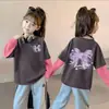 Camiseta de Manga Larga de Algodón Puro para Niñas Cuello Redondo Estampado de Dibujos Animados Estilo Nuevo 2026 Elegante Estilo Coreano Bloque de Color Camiseta Básica