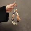 Cadena de Mano de Felpa de Fieltro de Lana Original con Cuentas Correa Corta para Muñeca Funda para Teléfono Móvil Llavero de Coche Colgante para Bolso Moderno