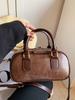 Bolso de mano distintivo de moda de invierno 2024, bolso de hombro texturizado retro, bolso cruzado elegante de estilo occidental para mujer.