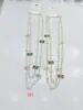 Colección Larga de Collares Superpuestos de Perlas Swarovski para Mujer, Estilo Lujo Ligero, Cadena Versátil para Suéter con un Toque de Alta Gama, Venta al por Mayor Otoño e Invierno