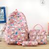 Nueva y bonita mochila escolar de gran capacidad para estudiantes de secundaria y universitarios, mochila informal de tres piezas de alto valor.