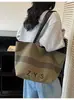 Bolsa de Lona Listrada Transfronteiriça Feminina Grande Capacidade 2025 Nova Outono e Inverno Versátil Simples Bolsa de Ombro Bolsa Tote para Estudante Universitário