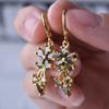 Ebay Venta Caliente Chapado en Oro de 18K Incrustado Gotas de Agua Aretes de Zircón con Forma de Pera Aretes de Flores Hebilla para la Oreja Aretes de Clip para la Oreja para Mujer
