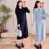 Elegante y cómodo vestido suéter de otoño/invierno para mujeres embarazadas, con corte holgado, diseño nuevo, talla grande, estilo dulce y sencillo, cuello mandarín y corte a media pierna que crea un efecto adelgazante.