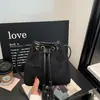 Bolsa de cordón suelta para mujer, nuevo estilo otoño 2026, bolso de mano de moda, bolso de hombro, bolso cubo retro para ir al trabajo, bandolera