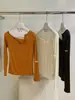 Camiseta WGWE de Outono Estilo Coreano Minimalista Slim Fit Assimétrica Botões Uma Alça Manga Longa W10761