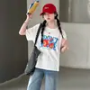 Conjunto de verano para niña 2026 nuevo elegante camiseta infantil de manga corta jeans casuales conjunto de dos piezas se ve bien