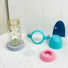 Nueva mamila de PC de boca ancha anticólicos con asa para bebés de 0 a 6 meses, empaquetada en una caja de color