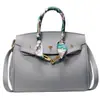 Bolso de Mano de Lujo Ligero Transfronterizo, Bolso Cruzado para Mujer, Estilo Nuevo con Hebilla de Cierre, Bolso de Hombro Versátil, Patrón de Lichi, Bolso de Mano de Alta Gama para el Trabajo