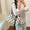 Bolsa de mão de poá de nicho para mulheres 2026 nova bolsa de ombro única retrô de alta qualidade bolsa tote para o dia a dia
