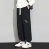 Pantalones deportivos jogger de talla grande para hombre, nuevos pantalones deportivos de moda con cordón para primavera y otoño, pantalones largos casuales holgados estilo americano que estilizan