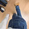 Calça Jeans Stretch Retrô Plus Size Feminina Primavera e Verão para Meninas Cheinhas Shape Pera Cintura Alta Emagrecedora Reta Calça Ferradura