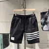 Nuevos pantalones cortos de seda helada de secado rápido para hombre, elásticos, alta calidad, pantalones de cinco puntos, pantalones de playa finos, pantalones de longitud media, marca de moda