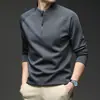 Nueva moda otoñal de moda, camiseta de manga larga con cremallera a media altura y cuello alto de color liso, sudadera, ropa elegante y versátil para hombre