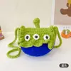 Bolsa de dibujos animados con textura de nicho, fresca, estilo chica simple, bolsa nueva 2023, bolsa tejida a mano de monstruo pequeño, bolsa de hombro
