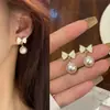 Populares Aretes de Mariposa con Goteo de Aceite, Aretes de Perlas de Alta Calidad, Tendencia Celebridad Retro Francés Nicho Fabricante de Aretes Venta al por Mayor