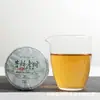 Chá Pu'er de Yunnan Atacado 50g de árvore antiga (Montanha Verde) chá pu'er cru Bolo de chá de árvore grande árvore velha