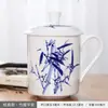 Taza de Té de Cerámica Jingdezhen Hueso de China Porcelana Azul y Blanca con Tapa para Reuniones en Casa Oficina Taza de Té Grabado Venta al Por Mayor