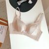 Productos originales genuinos Ropa interior de algodón de leche japonés para mujer Sujetador inalámbrico push up para realce de busto ajustable para exportación de comercio exterior