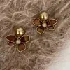 Brincos Maillard Retro Flor Pérola 2025 Novo Inverno Suave Alto Padrão Nicho Elegante Brincos Femininos