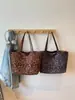 Bolso tote de moda de estampado de leopardo de nicho para mujer, bolso de hombro de gran capacidad, nuevo bolso versátil para el día a día de moda verano 2026