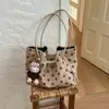 Bolso tote de lino de alta gama de nicho con lunares, nuevo modelo 2026, versátil para ir al trabajo, bolso de hombro y axila de gran capacidad