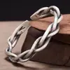 2023 Pulsera tejida retorcida abierta retro europea y americana Pulsera chapada en cobre y plata Pulsera geométrica para hombre venta al por mayor