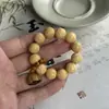 Cuentas Pequeñas Torcidas a Mano de Sándalo Verde y Sándalo Dorado Combinadas con Vaina de Loto y Anillo Corredizo Joyería para la Punta del Dedo, Pulsera Unisex Artística Inspirada en el Zen para Envolver el Dedo