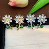 Pendientes de circonita con diseño de girasol y explosiones transfronterizas, ligeros, lujosos y elegantes, con personalidad, diseño de nicho y sentido de la moda coreana.
