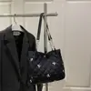 Bolsa Nova Texturizada de Grande Capacidade Outono e Inverno 2025 Bolsa de Ombro Casual Moderna Personalizada Design de Nicho Bolsa Tote