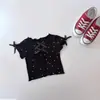 Verão 2026 Roupa para Bebê Menina Top Doce de Bolinhas com Laço Manga Curta Camiseta Fofa e Versátil para Meninas
