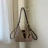 Bolsa de Ombro Única Grande Capacidade Versátil Outono/Inverno Nova para Mulheres Fashion 2026 Tendência Temperamento Transversal Dupla Ombro Casual Simples